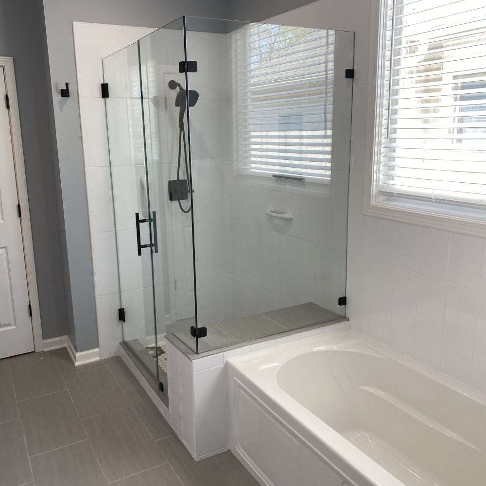 Spa-inspired bathroom with smart shower systems, radiant floors, and aromatherapy soaking tub by Stag Homes Design Build in Kansas City